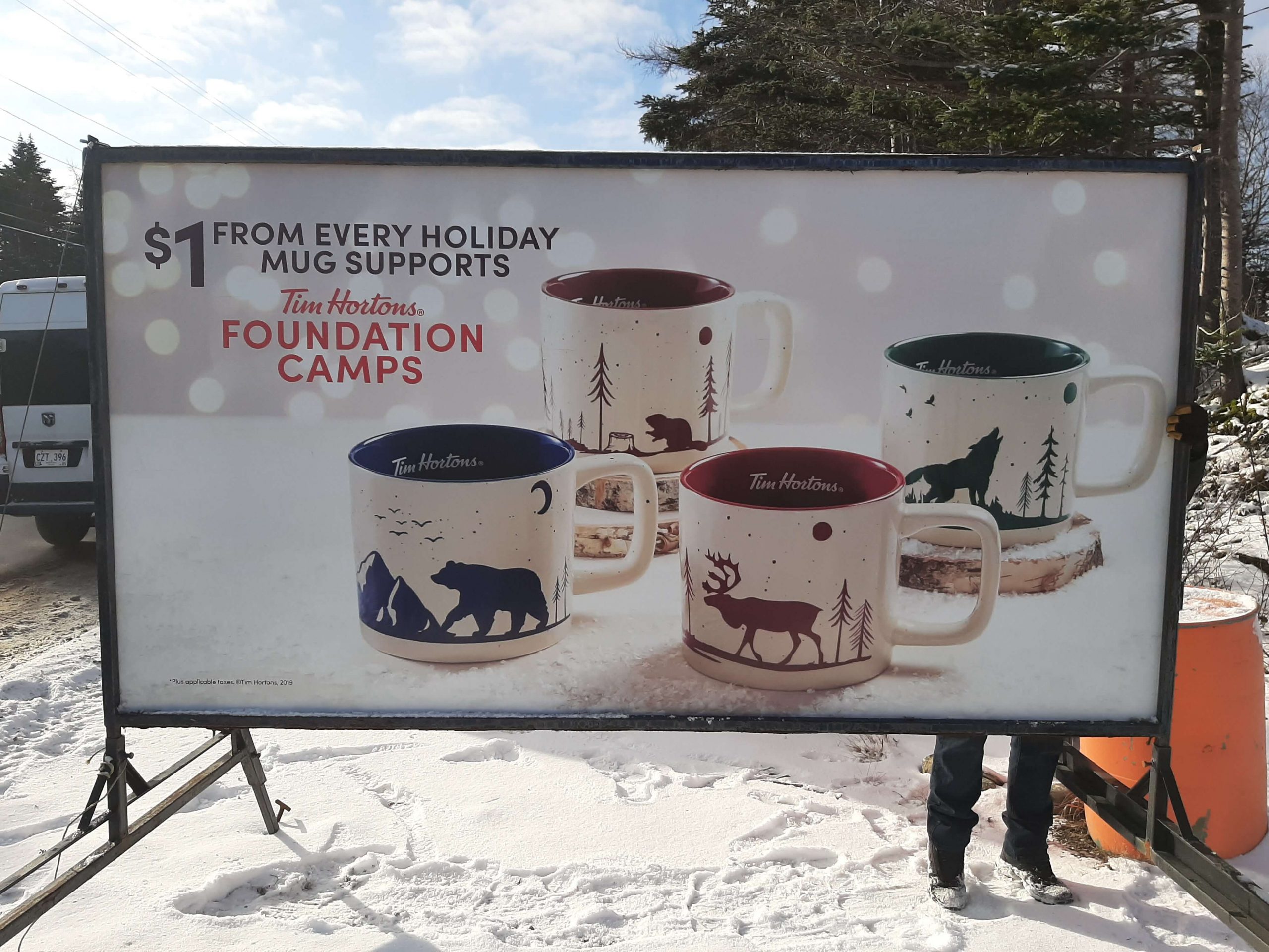 Tim Hortons foundation camps sign with mugs