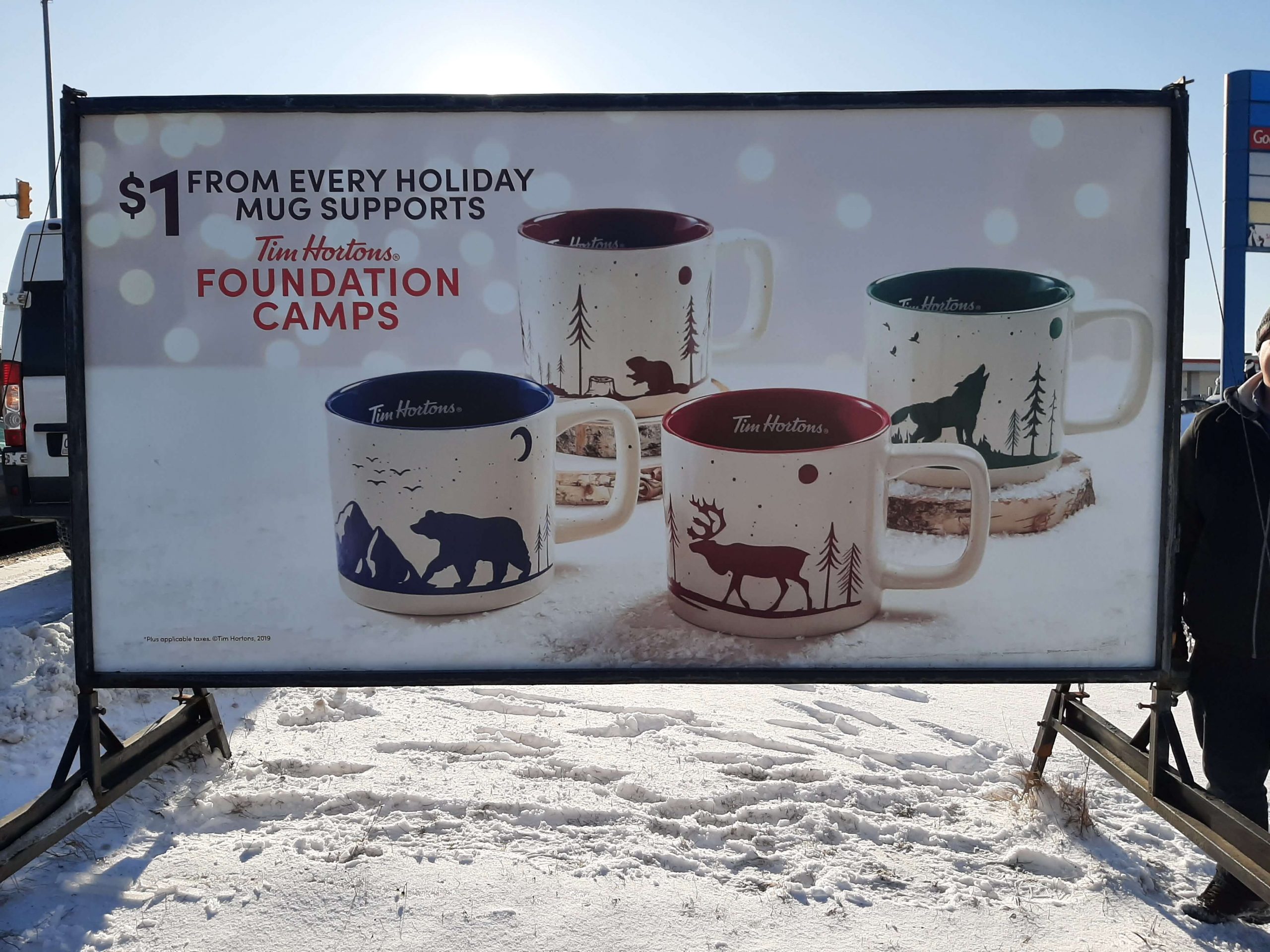 Tim Hortons foundation camps sign with mugs
