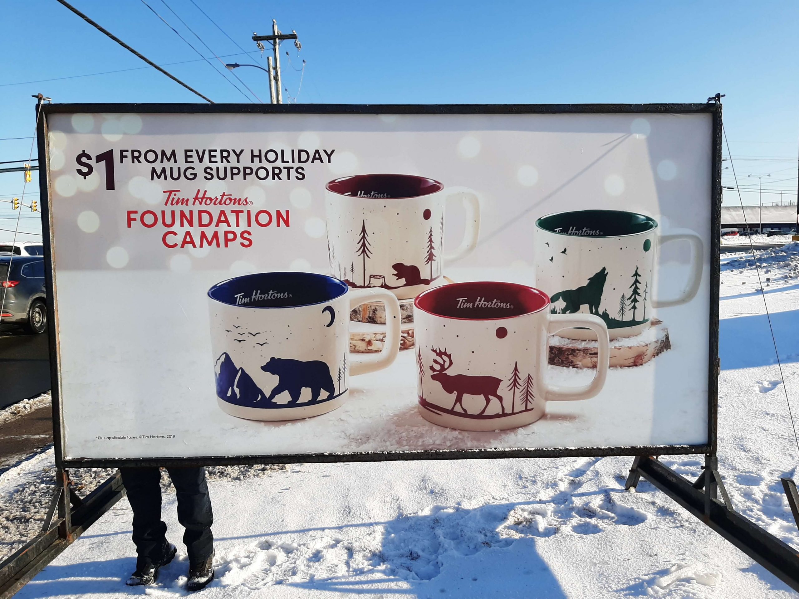 Tim Hortons foundation camps sign with mugs